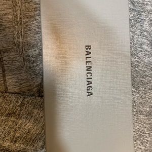 Black leather balenciaga buckled pointed flats.